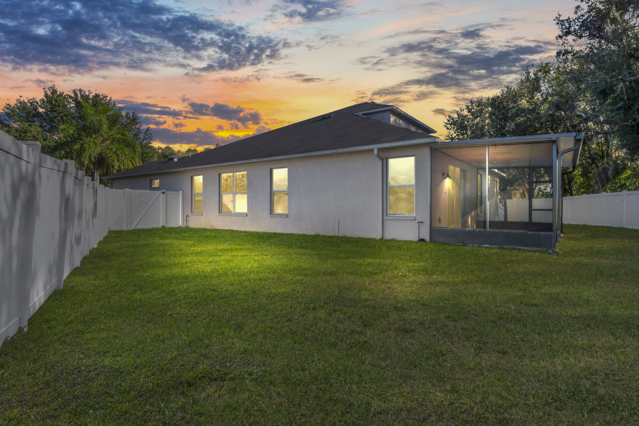 Backyard and pool at twilight at a Tampa Bay Florida home